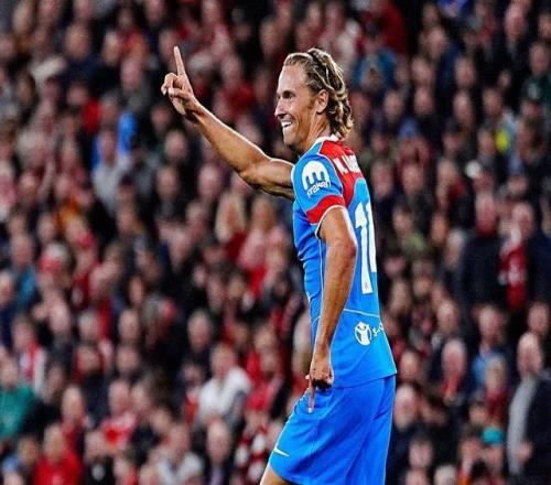 略伦特欧冠做客安菲尔德进4球参与5球，与本泽马并列最多